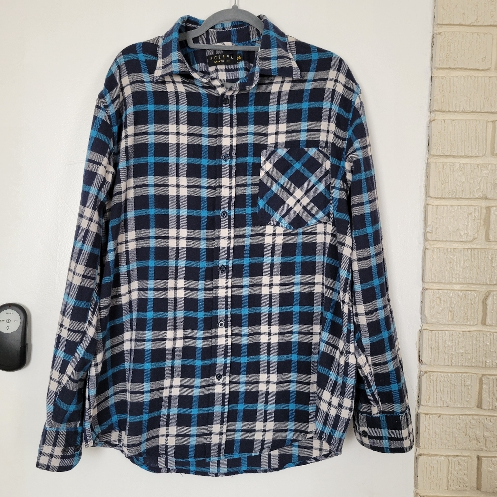 Activa Blue, black, and white long sleeve flannel shirt with front pocket